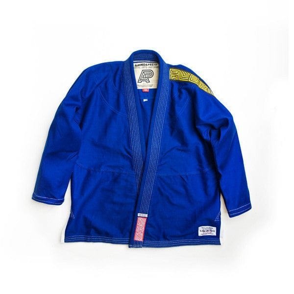 Albino Preto Batch Six Gi in Navy, White, and Royal Blue, featuring pearl weave cotton and tailored fit, displayed on a mannequin for BJJ enthusiasts.