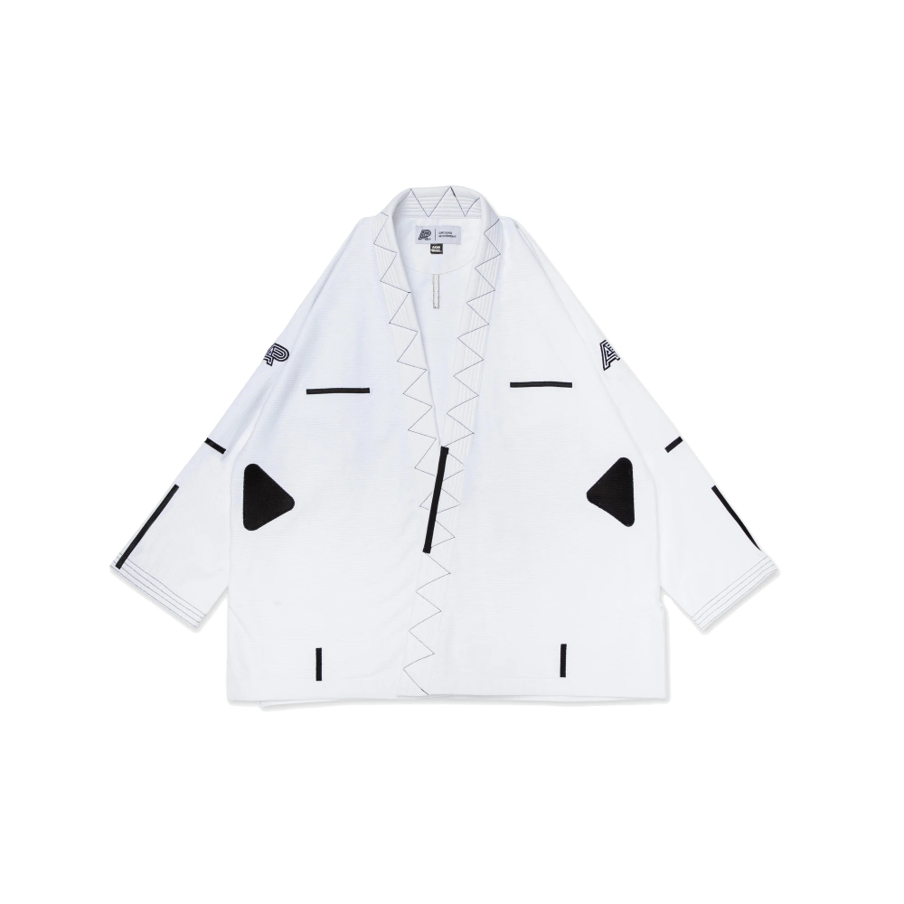 Albino and Preto Bjj Gi Ground Movement White with bag shown as premium Brazilian Jiu Jitsu training uniform for mobility and durability