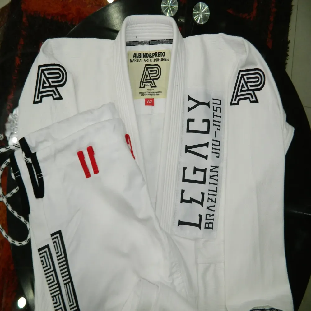 Albino and Preto A&P Legacy White BJJ Gi designed for Brazilian Jiu Jitsu training and competition