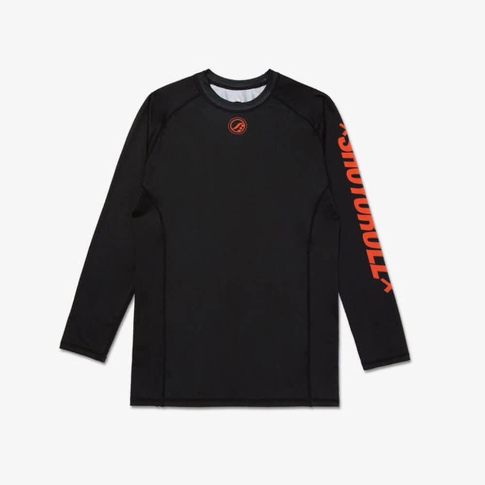 Shoyoroll Ember Black BJJ Rash Guard Long Sleeve on model, front view, showcasing durable, comfortable design for Brazilian Jiu-Jitsu training