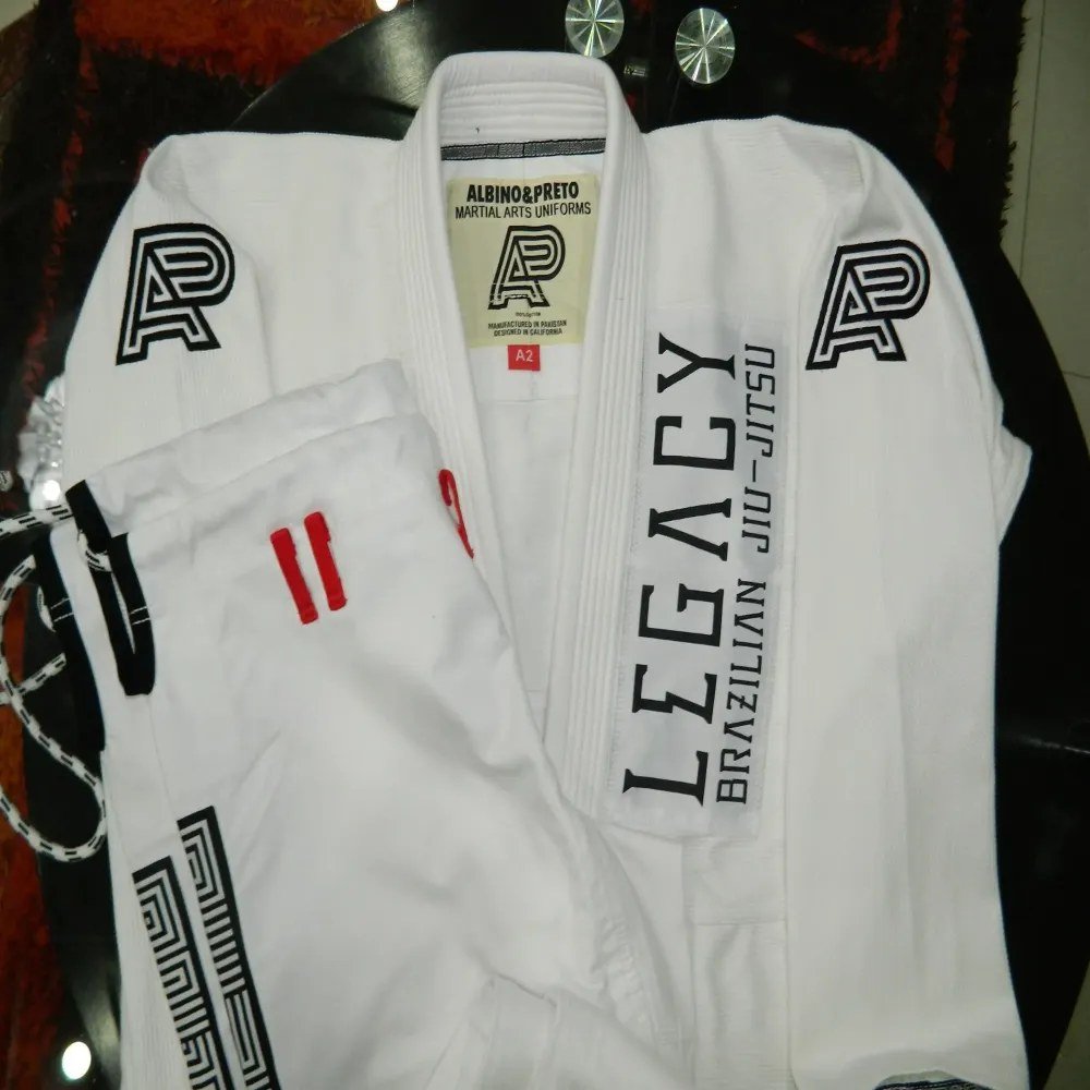 Albino and Preto Legacy White Gi – front view